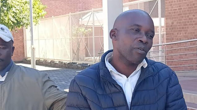 Judicial officer charged with threatening to kill