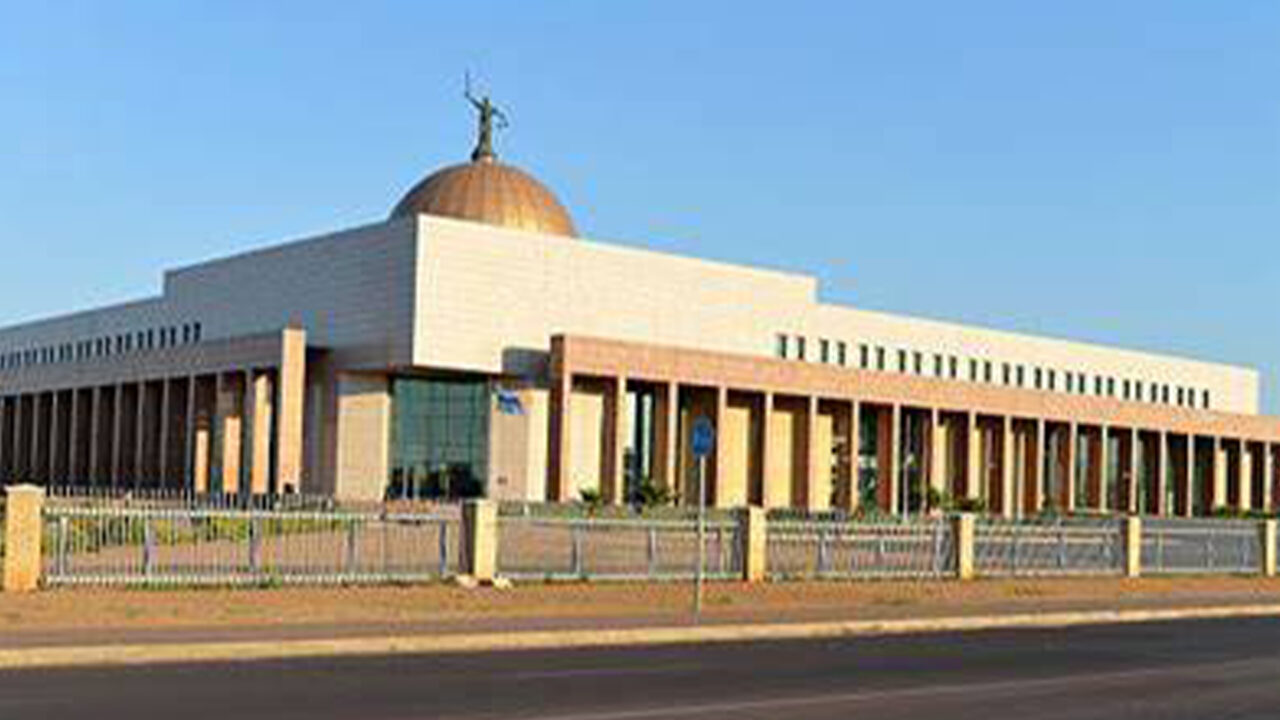 Judicial officer charged with threatening to kill