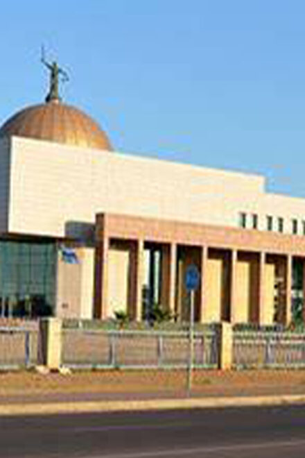 Judicial officer charged with threatening to kill